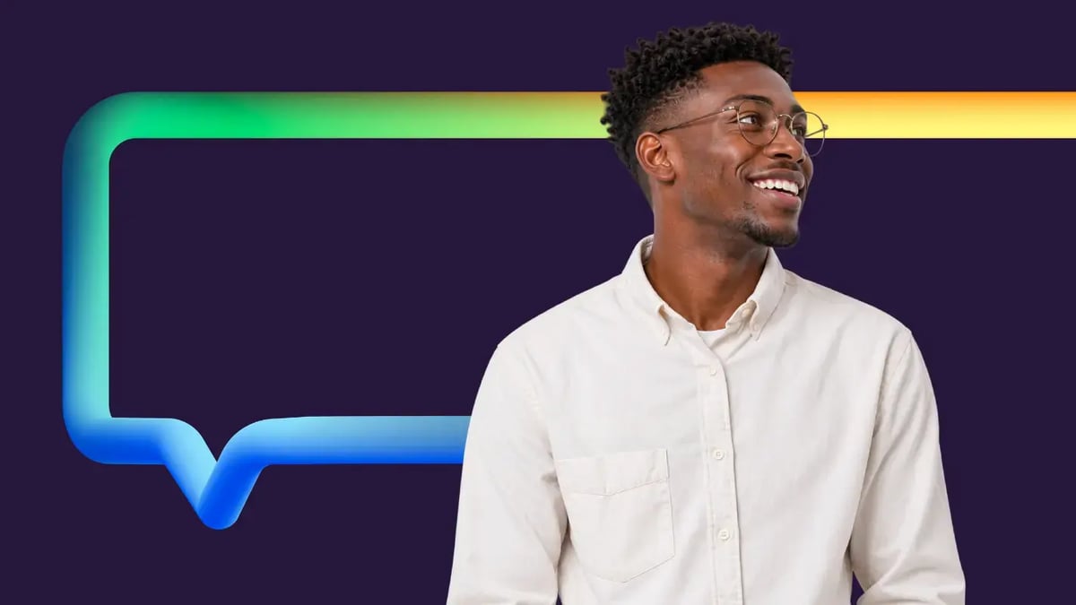 A smiling man wearing round glasses and an off-white button-down shirt looking to the right, positioned against a dark purple background alongside a 3D speech bubble outline with a gradient of green, blue, and yellow.